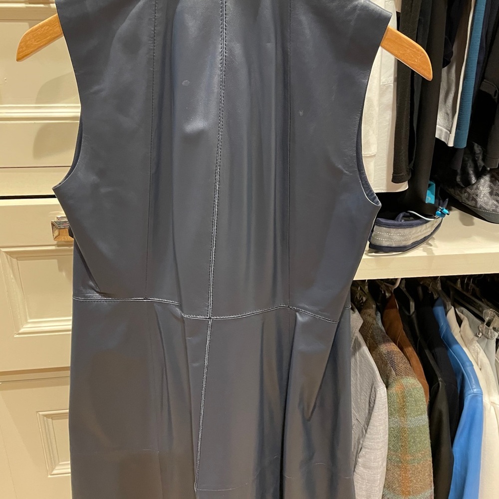 Leather sleeveless jacket